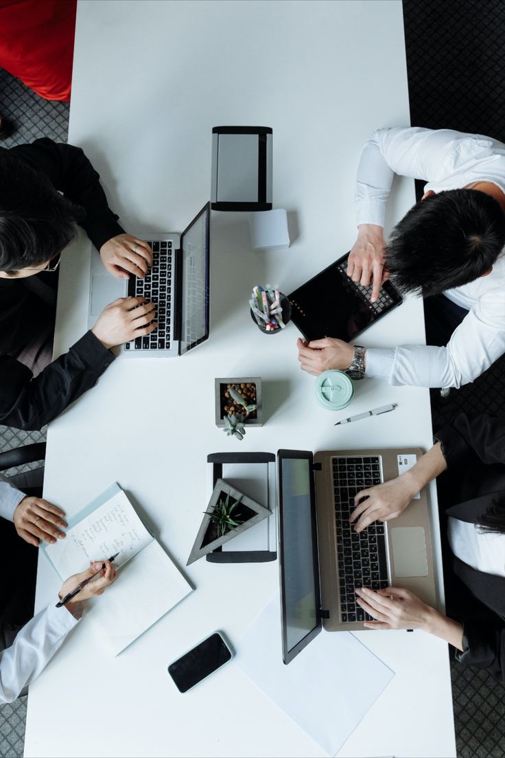 People collaborating at a table